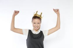 Woman with strong arms raised celebrating overcoming social anxiety