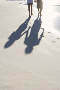 couple beach shadow